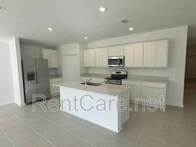 New Construction 4/3 in the beautiful Gated/Guarded Golf Community of Providence in Davenport! property image