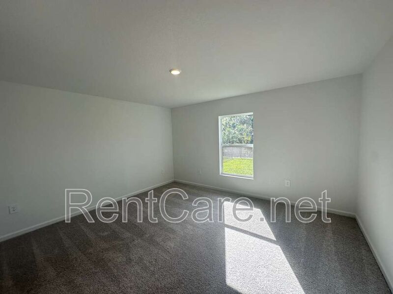 New Construction 4/3 in the beautiful Gated/Guarded Golf Community of Providence in Davenport! property image