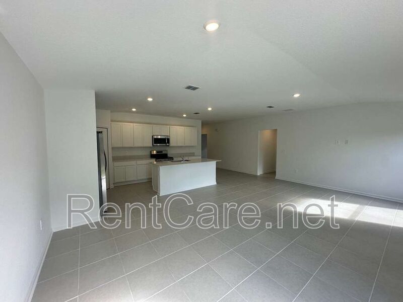 New Construction 4/3 in the beautiful Gated/Guarded Golf Community of Providence in Davenport! property image