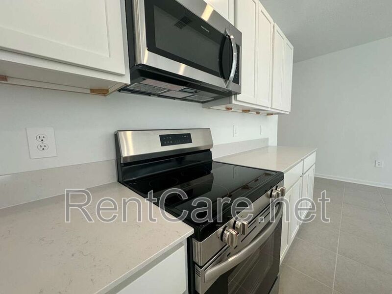 New Construction 4/3 in the beautiful Gated/Guarded Golf Community of Providence in Davenport! property image