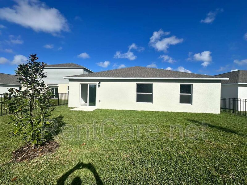 New Construction 4/3 in the beautiful Gated/Guarded Golf Community of Providence in Davenport! property image