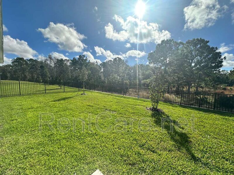 New Construction 4/3 in the beautiful Gated/Guarded Golf Community of Providence in Davenport! property image