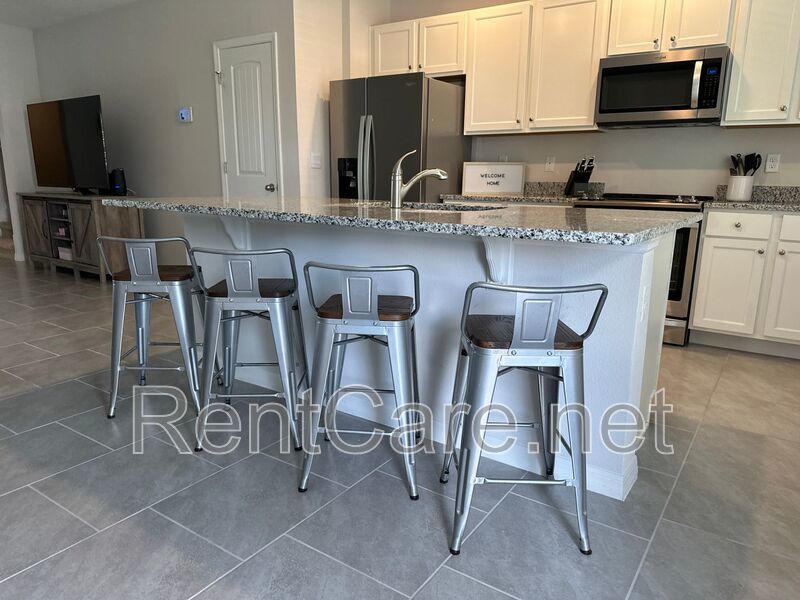 Resort Style Living! Stunning 3/2.5 Townhome in Waterleigh! Available April! property image