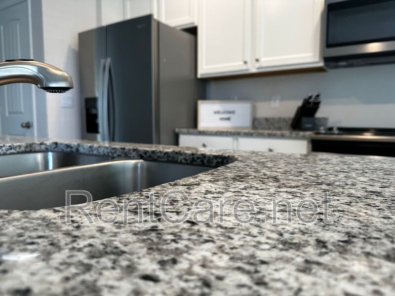 Resort Style Living! Stunning 3/2.5 Townhome in Waterleigh! Available April! property image