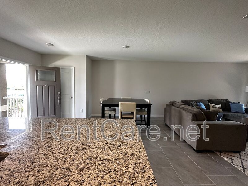 Resort Style Living! Stunning 3/2.5 Townhome in Waterleigh! Available April! property image