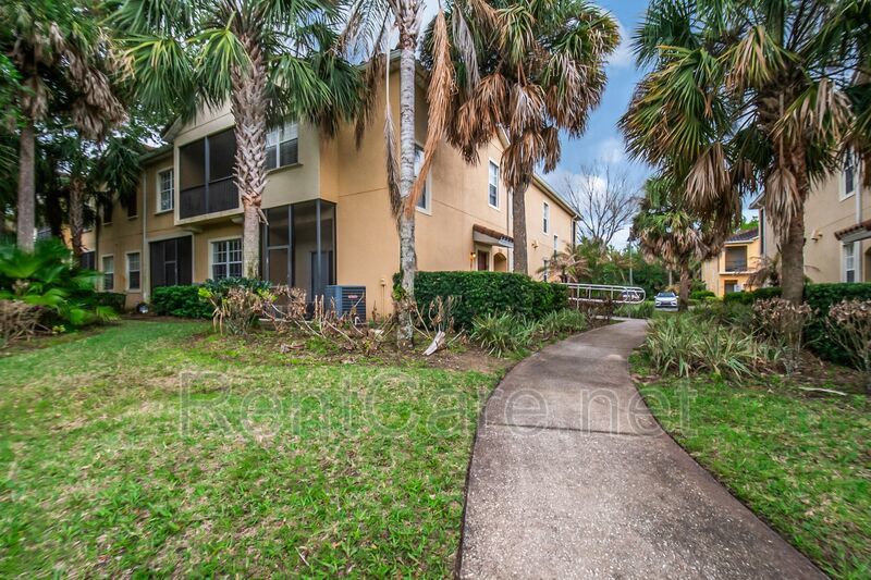 Spacious 3/2 Condo in the Gated Oakwater Community with Single Car Garage! Brand new carpets and Freshly Painted! property image