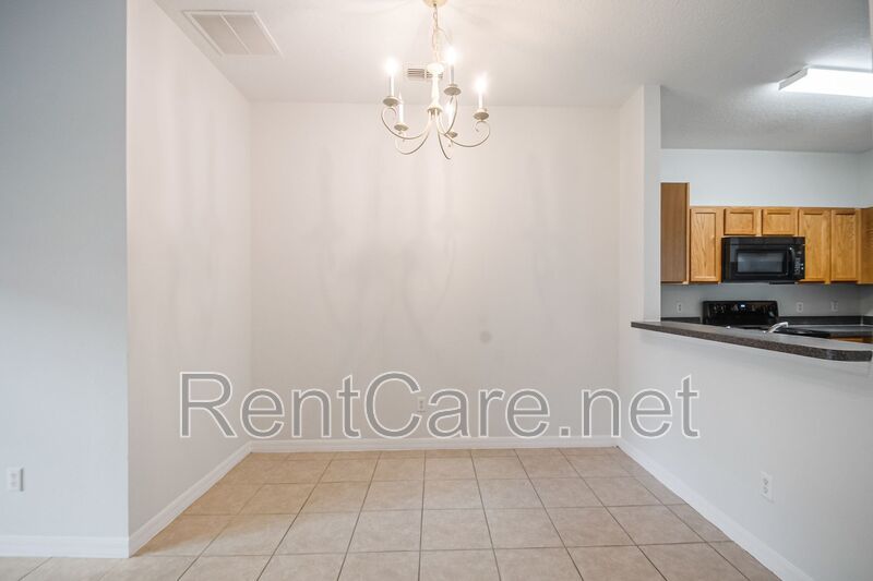 Spacious 3/2 Condo in the Gated Oakwater Community with Single Car Garage! Brand new carpets and Freshly Painted! property image