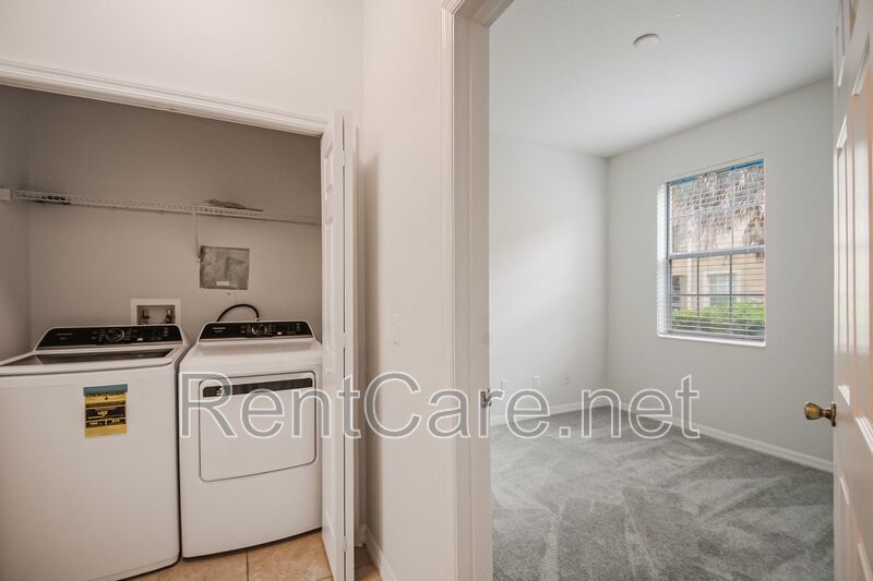 Spacious 3/2 Condo in the Gated Oakwater Community with Single Car Garage! Brand new carpets and Freshly Painted! property image