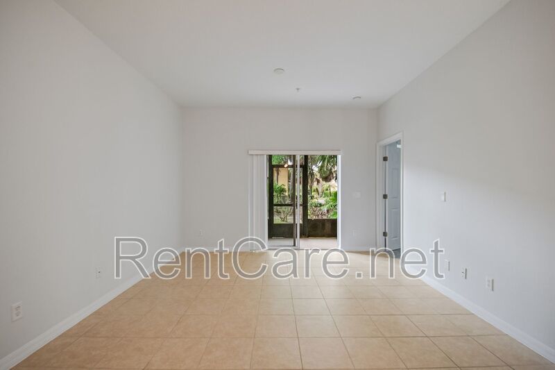 Spacious 3/2 Condo in the Gated Oakwater Community with Single Car Garage! Brand new carpets and Freshly Painted! property image