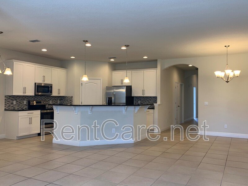 Beautiful 4/3 with fenced yard in Hunters Creek! Available August 2026 property image